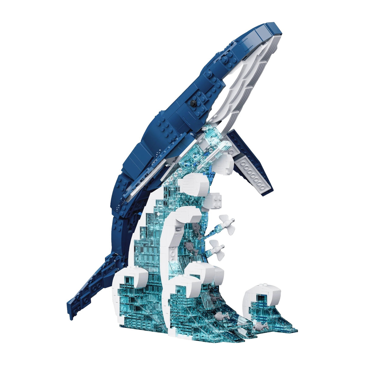 LEGO Baleine jaillissant de l'eau, tenue en l'air par sa propre vague en briques translucides turquoise