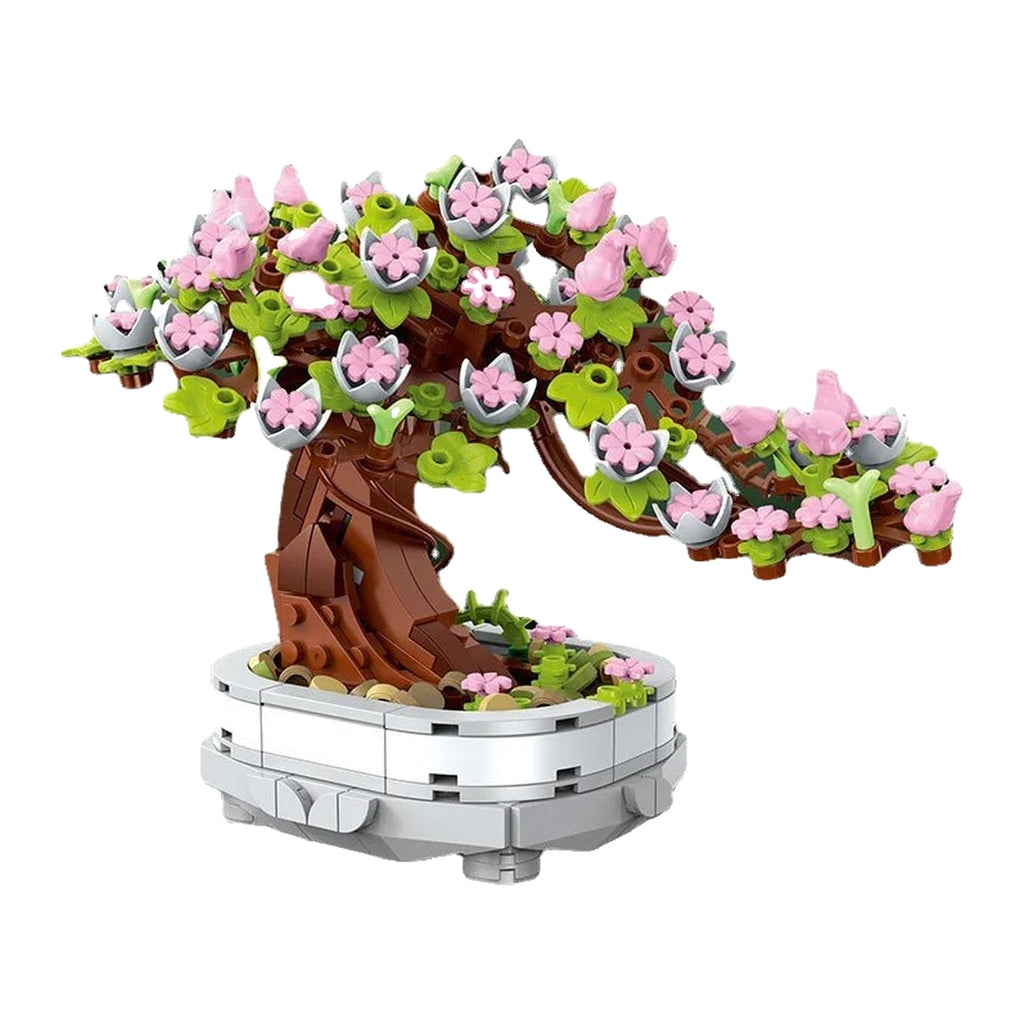 LEGO Bonsai dans sa coupe, tronc qui se divise et plateaux de feuillage posés un par un