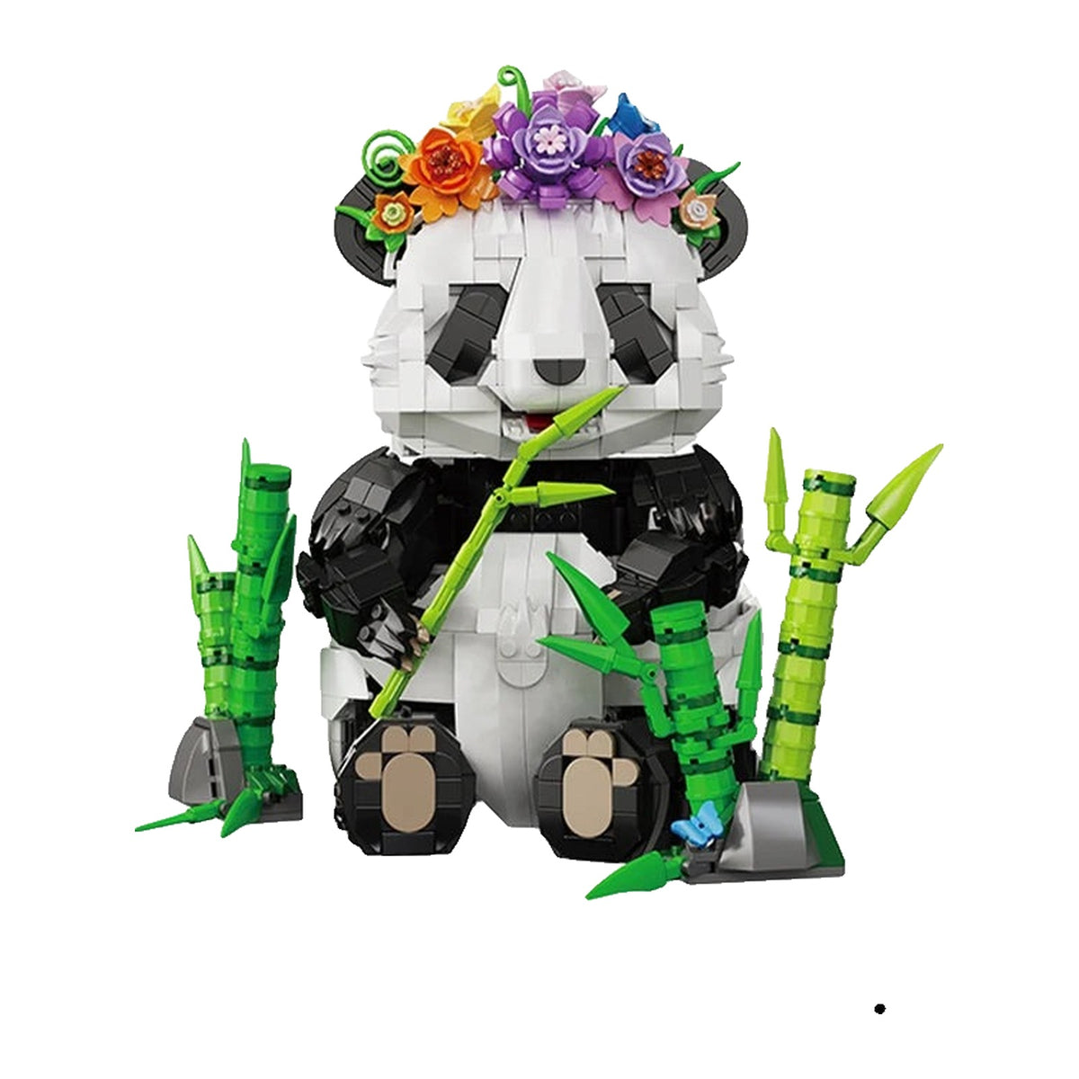 LEGO Panda assis, le dos rond, en train de mâcher sa tige de bambou en regardant ailleurs