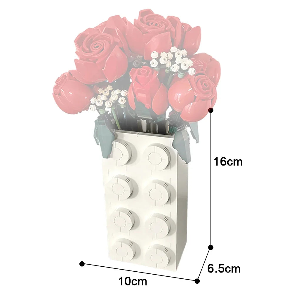 Contenant blanc de 16 cm vendu seul, sans les fleurs, à garnir soi-même sur une étagère ou un rebord de fenêtre