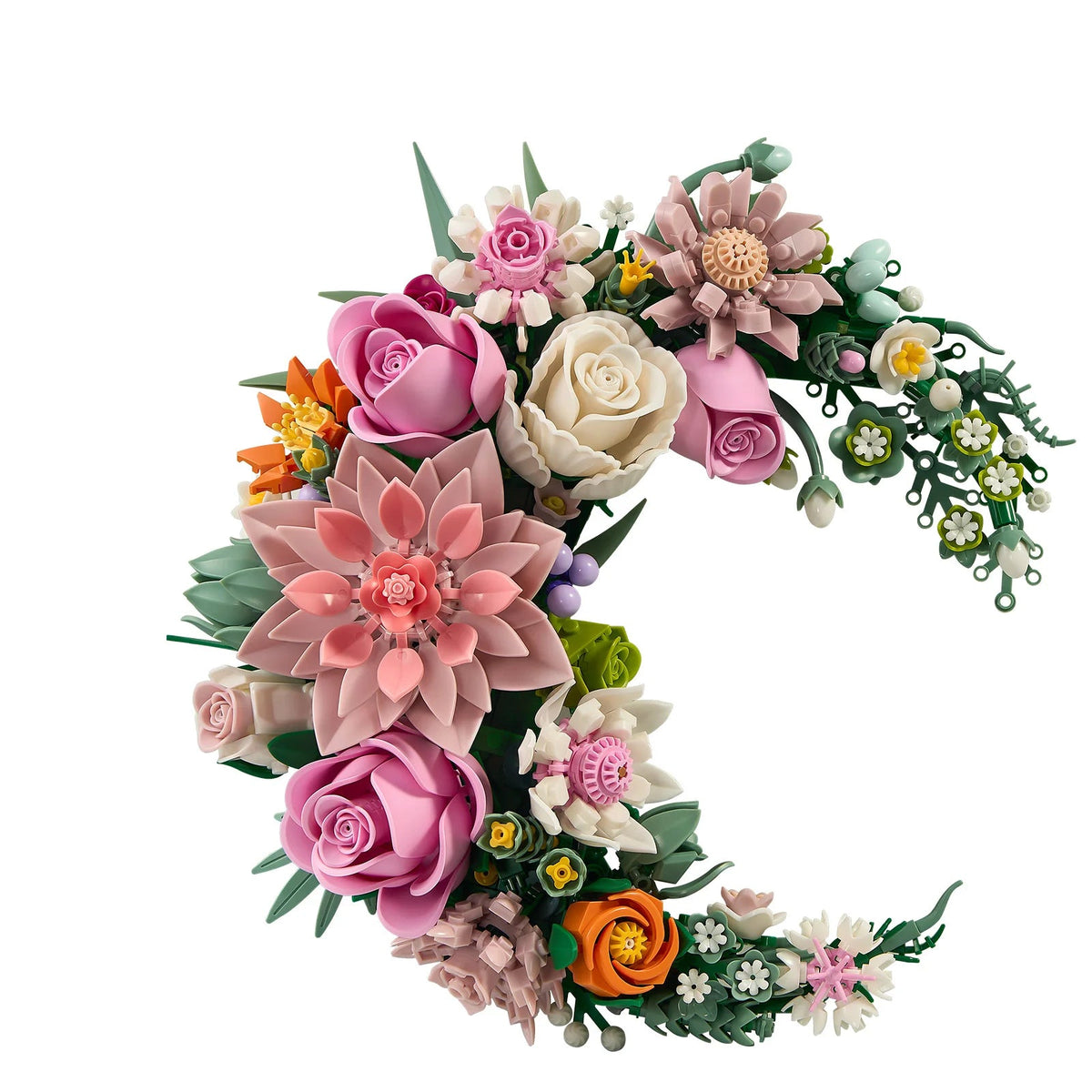 Couronne de Fleurs LEGO en croissant ouvert, roses blanches et roses posées sur un feuillage à deux verts