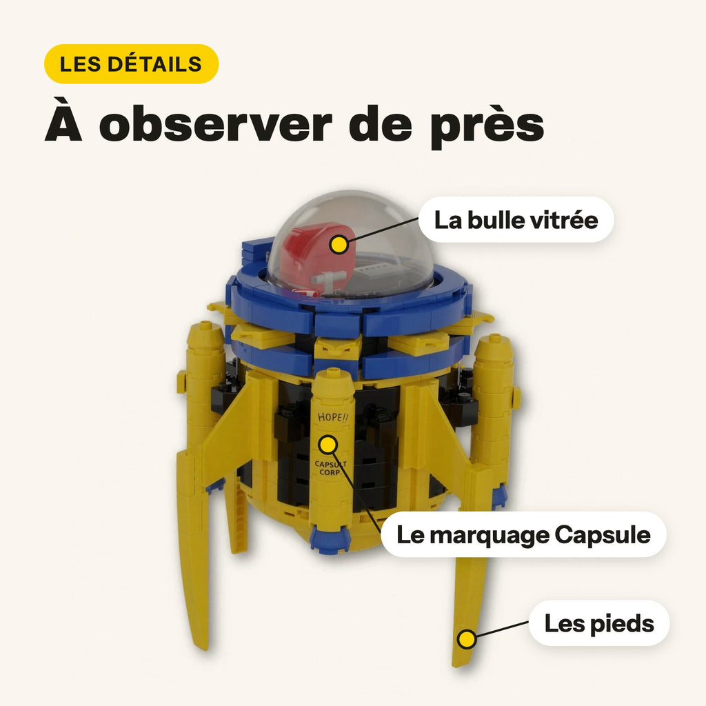 Détails de la machine de Trunks Dragon Ball en briques : bulle vitrée, marquage Capsule, pieds